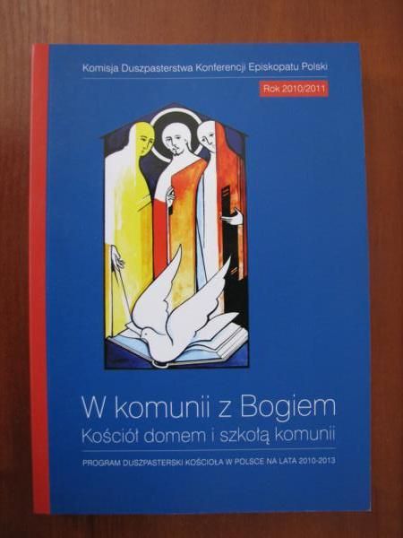Stułkowski Szymon (red.)  -  W komunii z Bogiem. Kościół domem i szkołą komunii