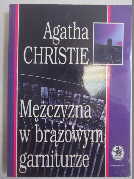 Christine Agatha  - Męzczyzna w brązowym garniturze