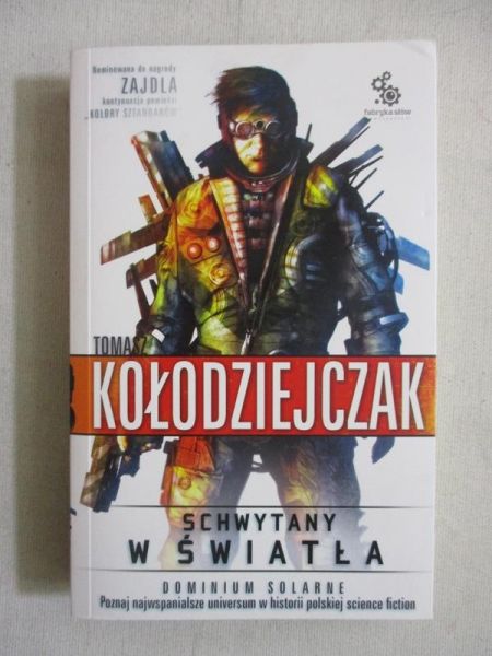 Kołodziejczak Tomasz - Schwytany w światła