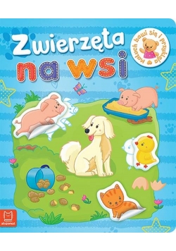 Maluch bawi się i przykleja Zwierzęta na wsi