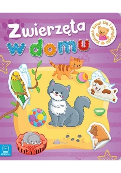 Maluch bawi się i przykleja Zwierzęta w domu